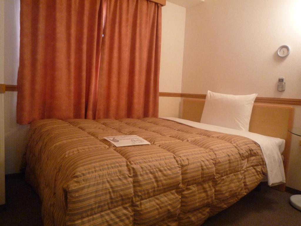 Toyoko Inn Hiroshima Heiwa-Odori Rom bilde
