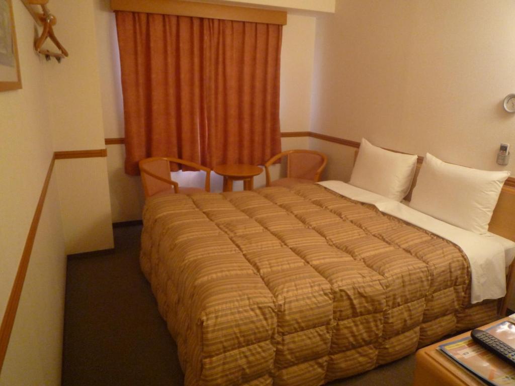 Toyoko Inn Hiroshima Heiwa-Odori Rom bilde